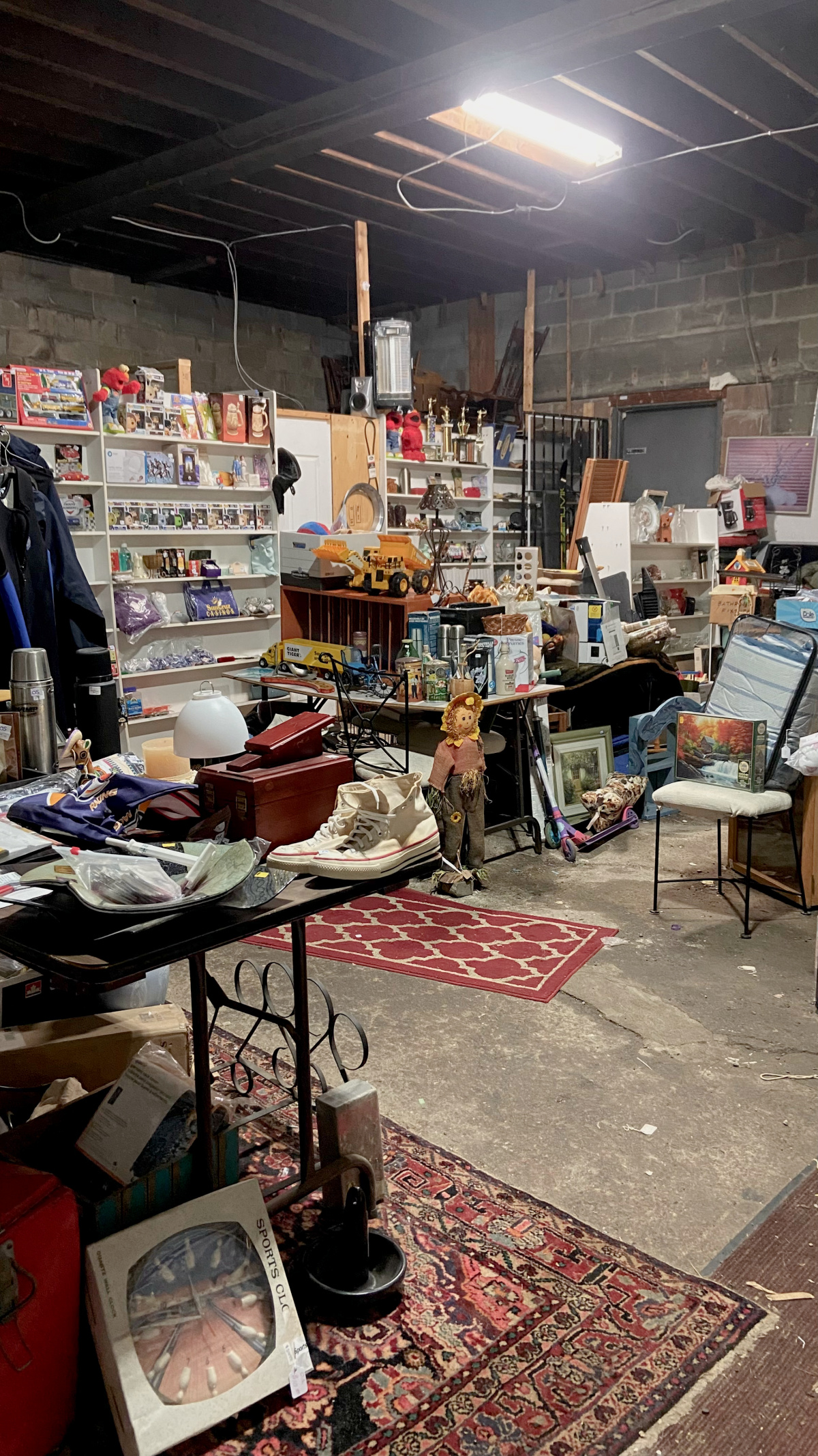 A semi-outdoor garage area of the antique shop, with still more vendor booths.