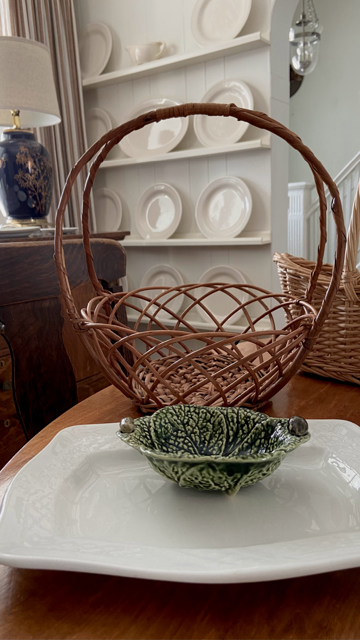 A little antiquing haul featuring a vintage basket, ironstone, and cabbage ware.