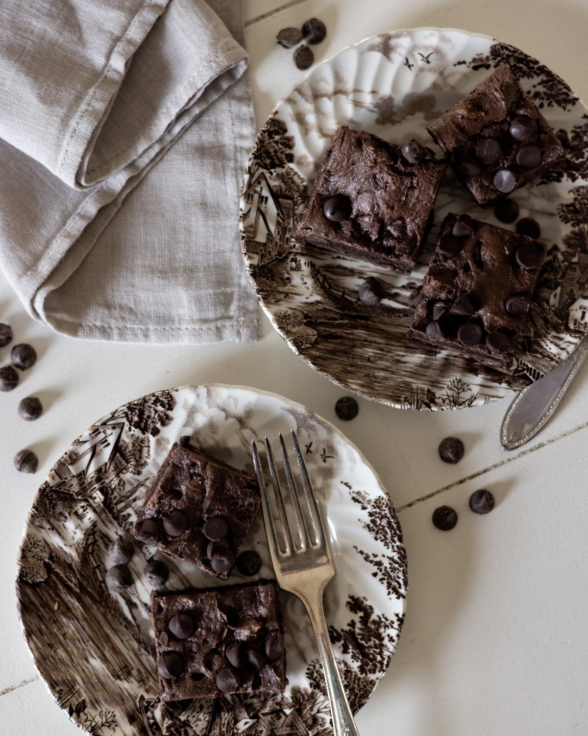 Brownies on brown and white transfer ware plates.