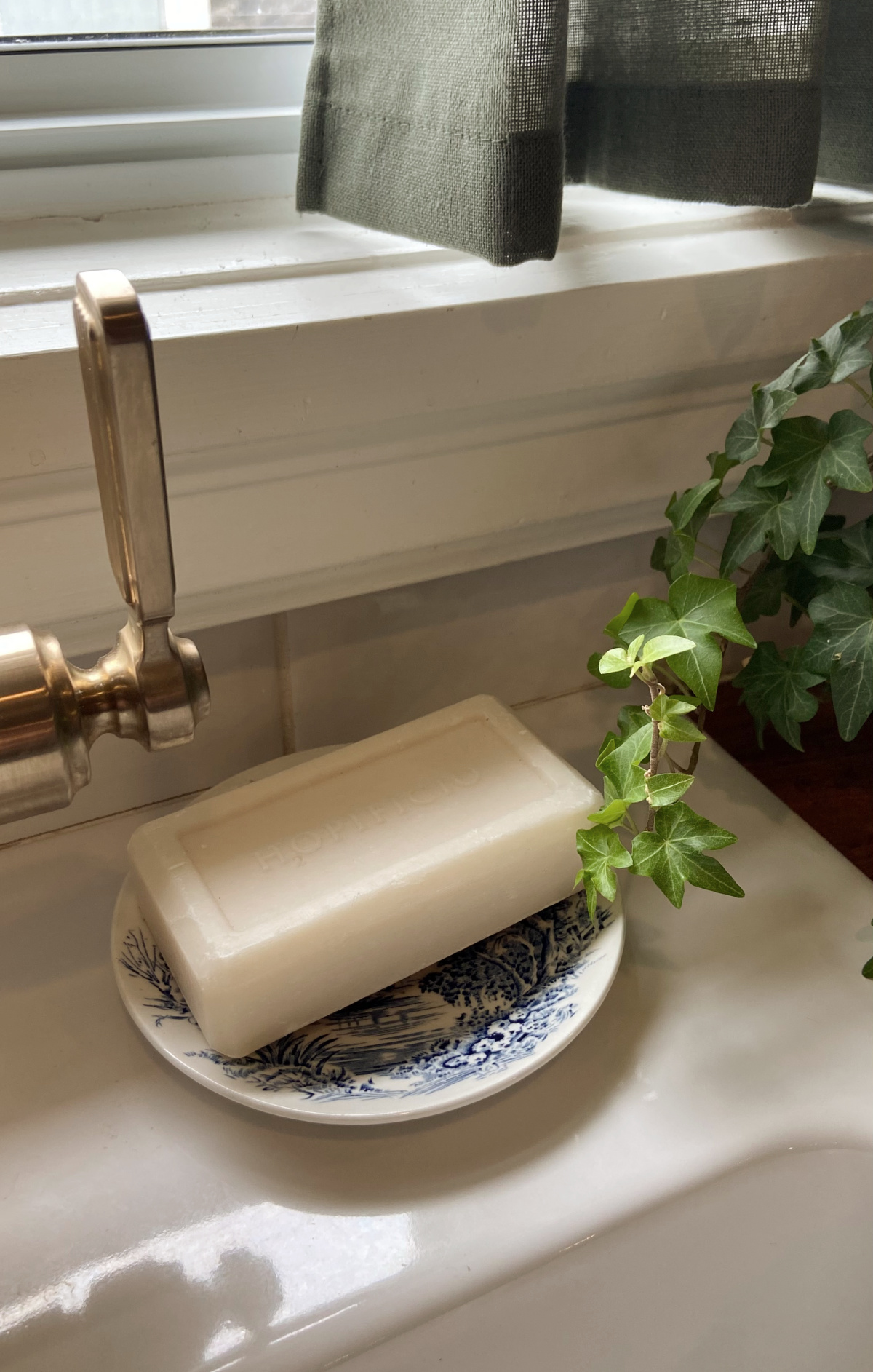 Using a vintage plate as a soap dish.