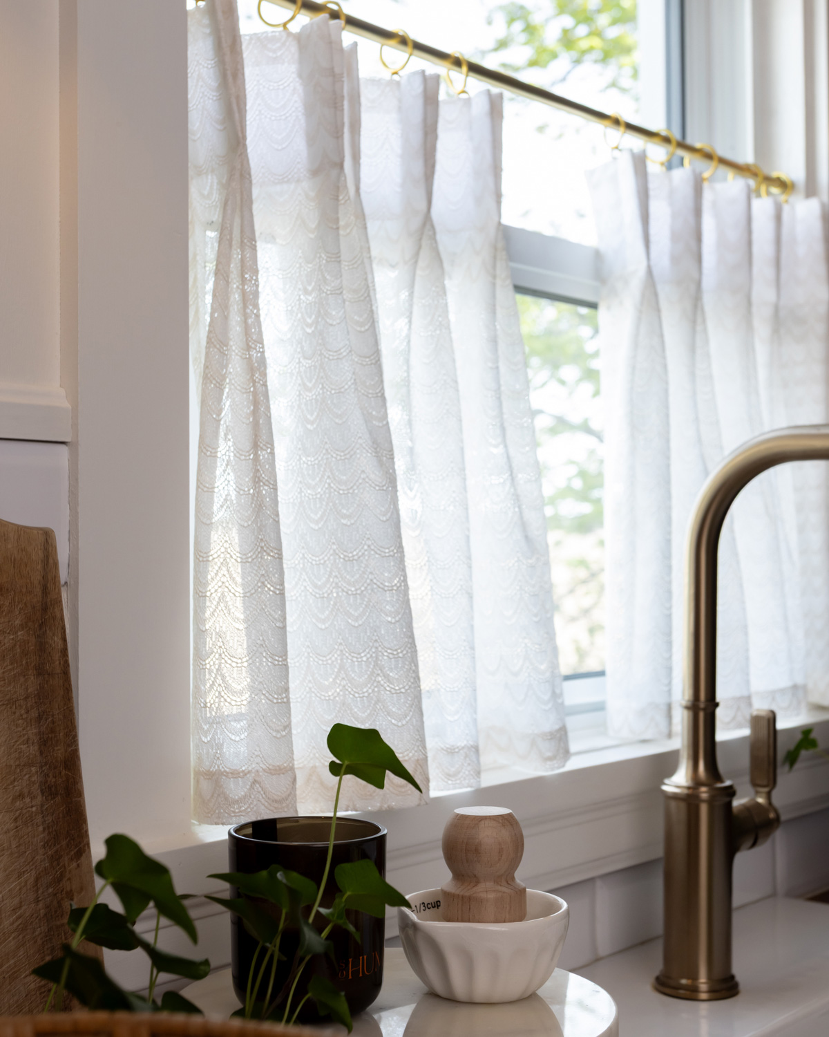 Lace curtains are an easy way to incorporate the doily and lace trend into your home.