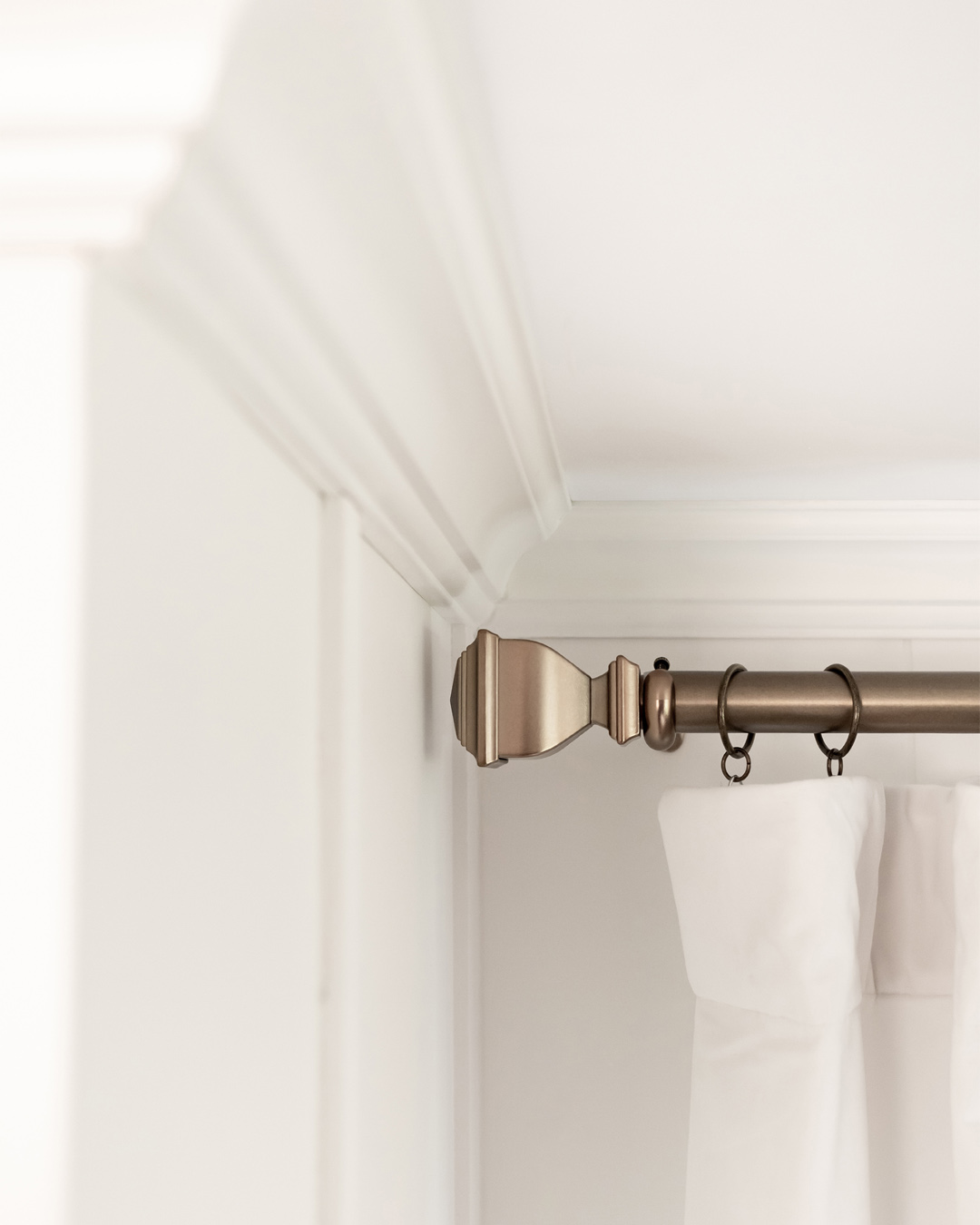 A beautiful aged brass curtain rod.