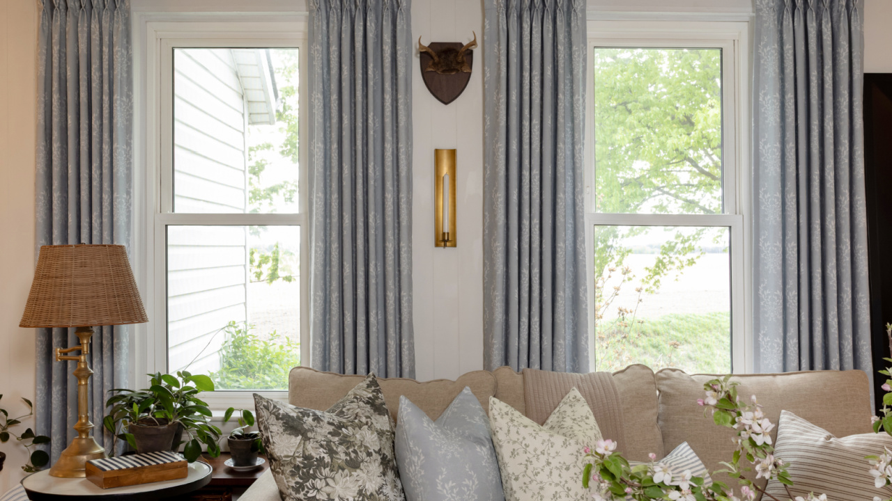 Custom pinch pleat curtains from Two Pages in my living room.