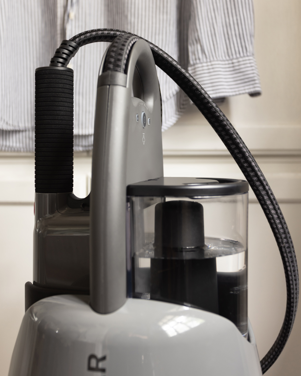 Preparing to steam clothing for the week with the IZZI Plus.