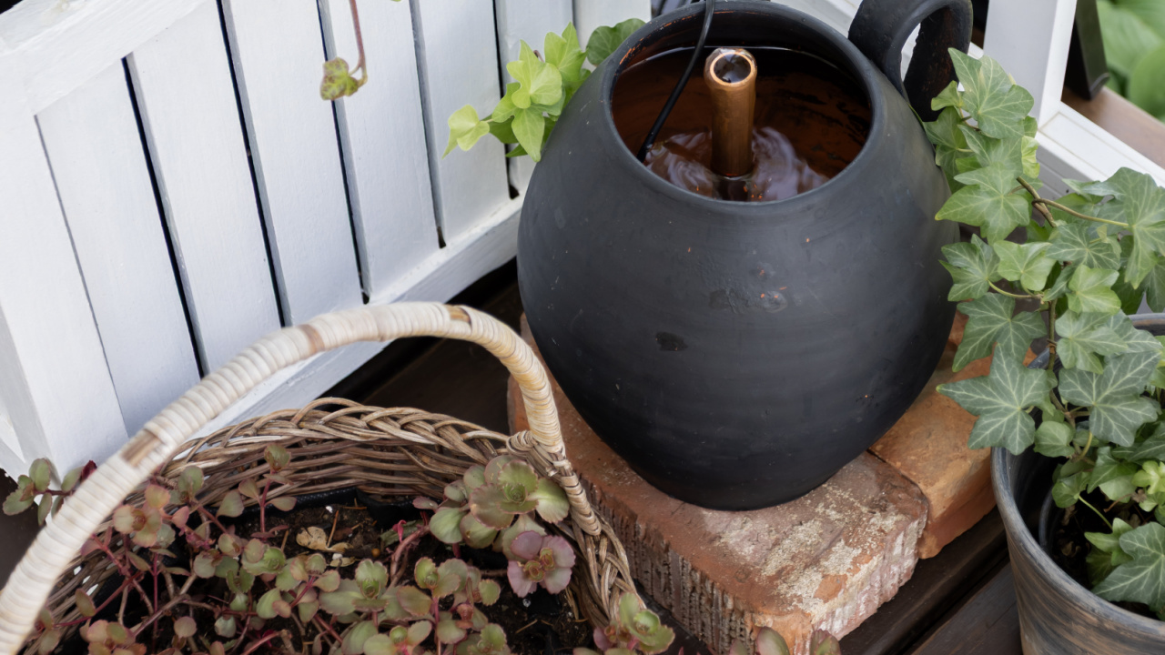 A DIY solar powered vintage vessel fountain.