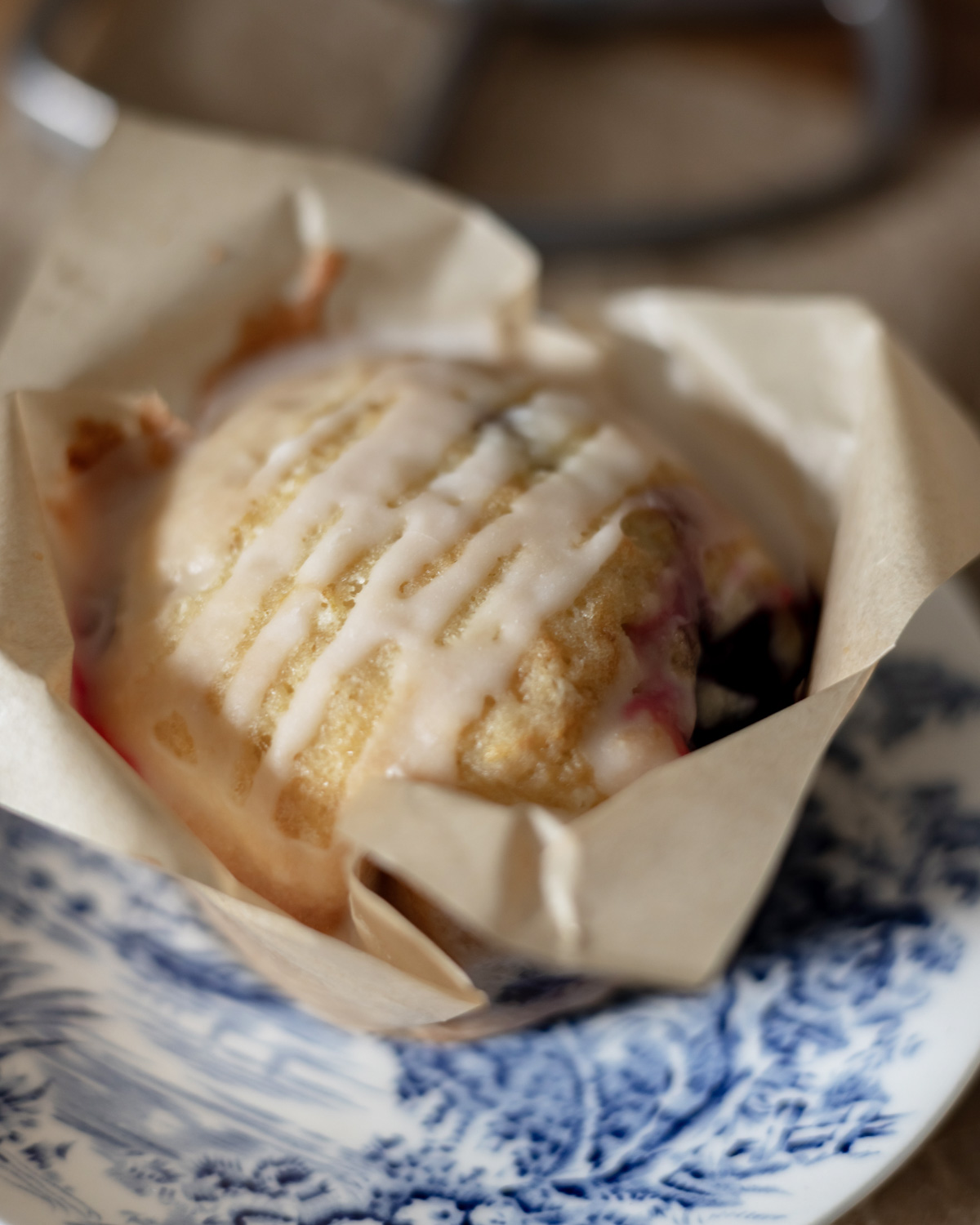 Lemon blueberry muffin with lemon glaze.