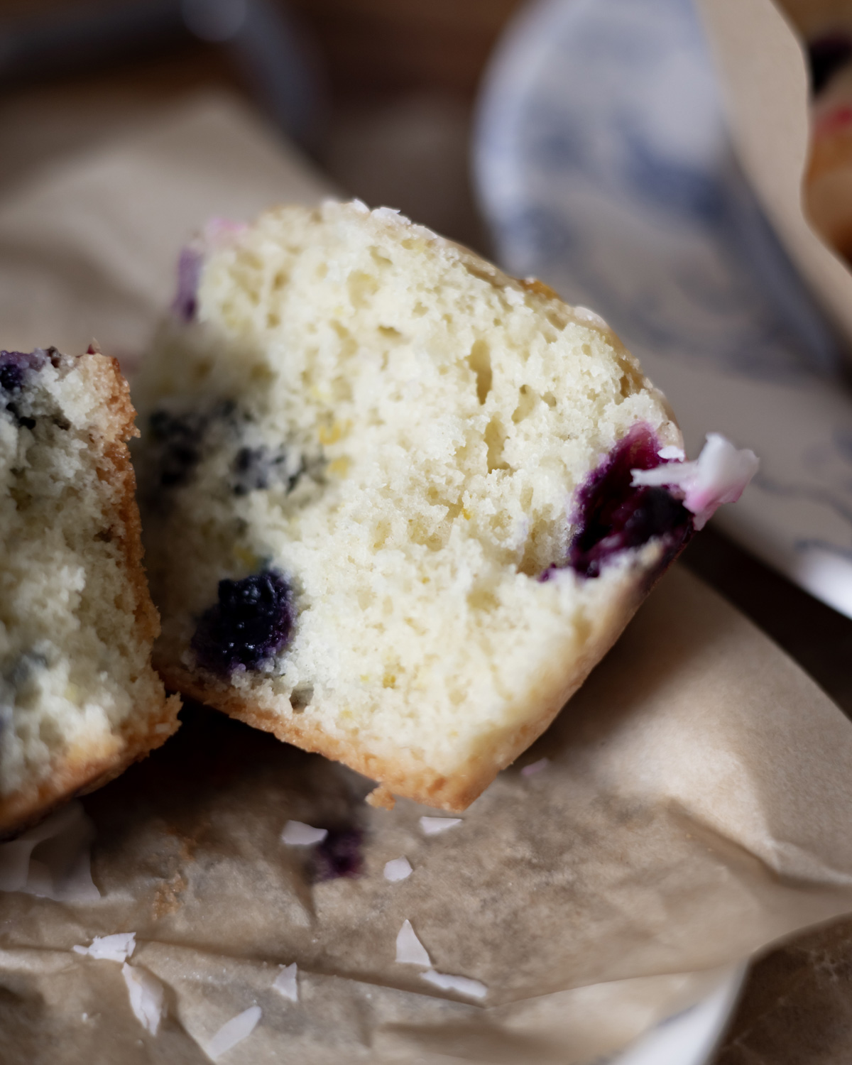 A close-up view of the inside of the lemon blueberry muffin to show texture.